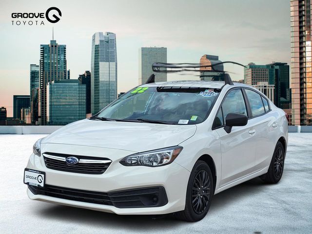 Crystal White Pearl 2022 Subaru Impreza Sedan AWD Sedan All-Wheel Drive 5-Speed Manual