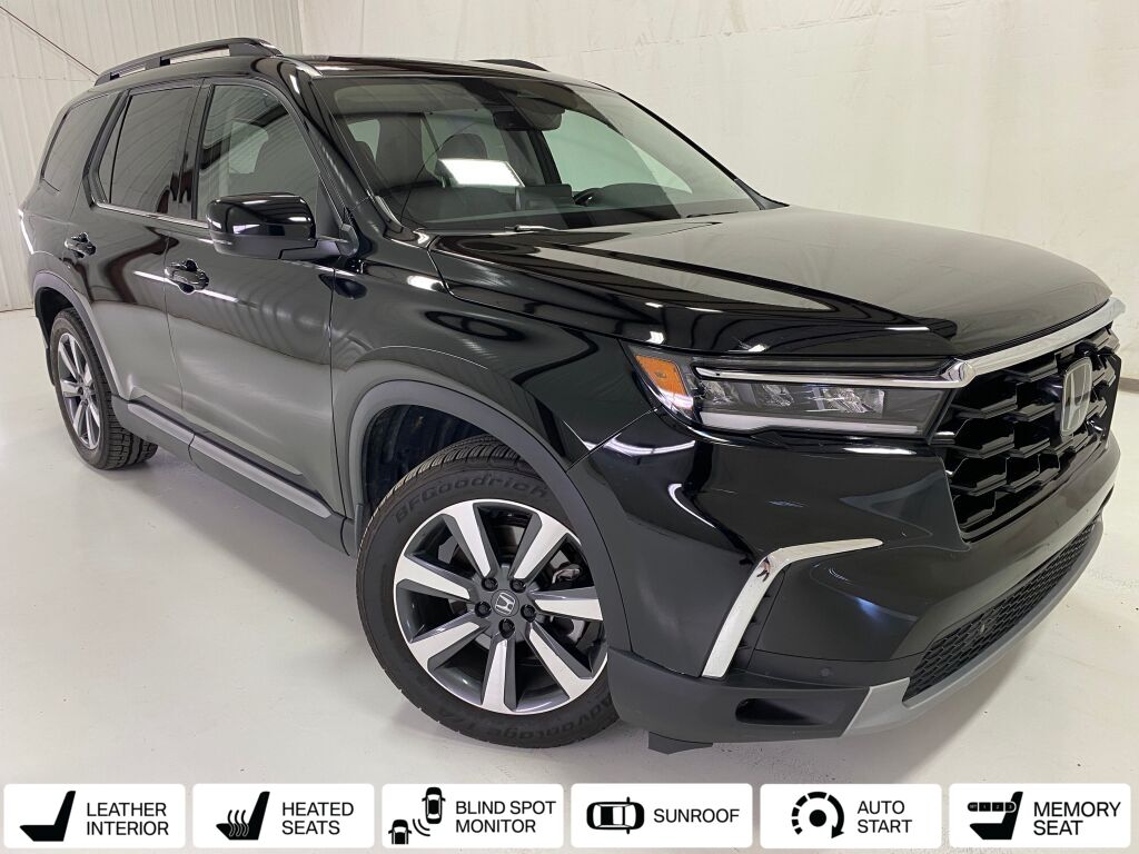 2024 Honda Pilot Touring Crystal Black Pearl at Spitzer Acura