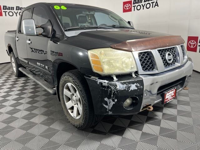 Galaxy Black Metallic 2006 Nissan Titan Pickup Truck Four-Wheel Drive 5-Speed Automatic Overdrive