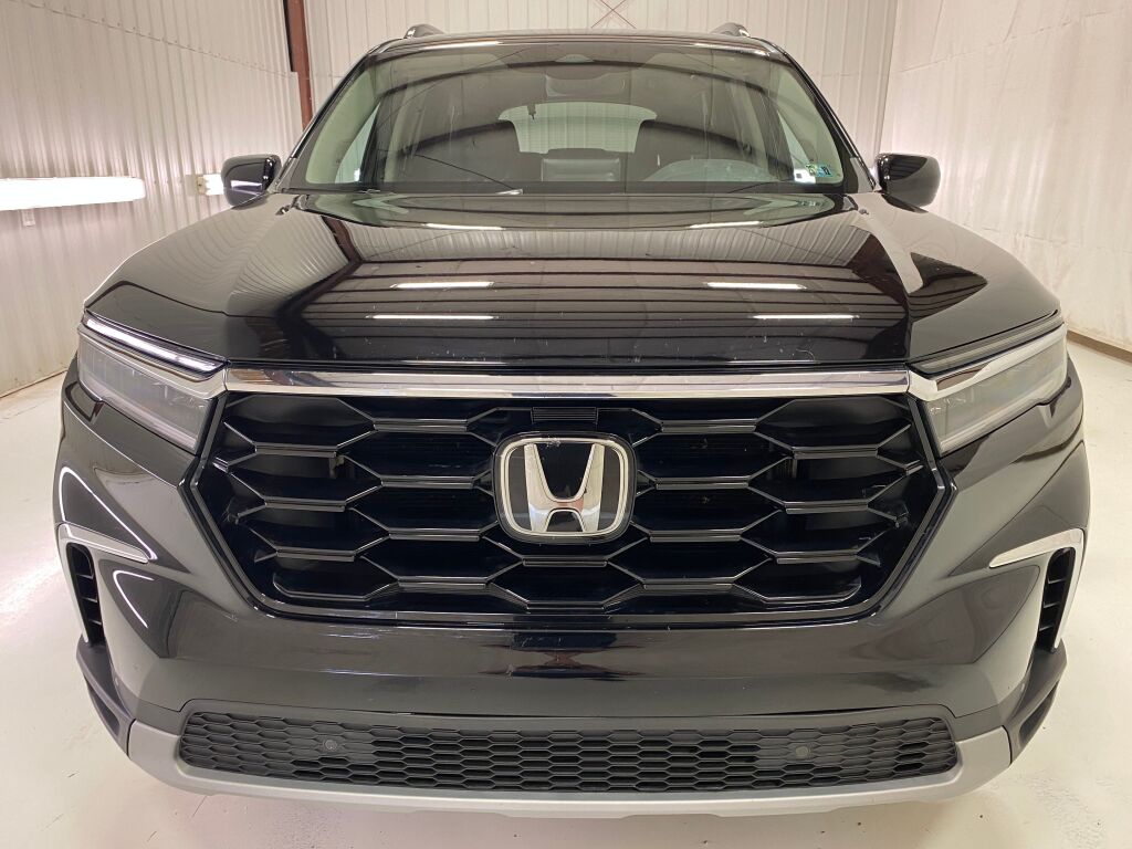 2024 Honda Pilot Touring Crystal Black Pearl at Spitzer Acura