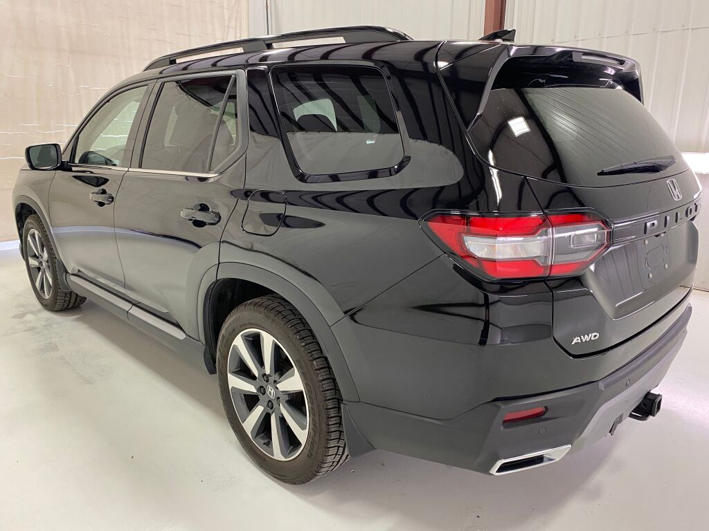 2024 Honda Pilot Touring Crystal Black Pearl at Spitzer Acura
