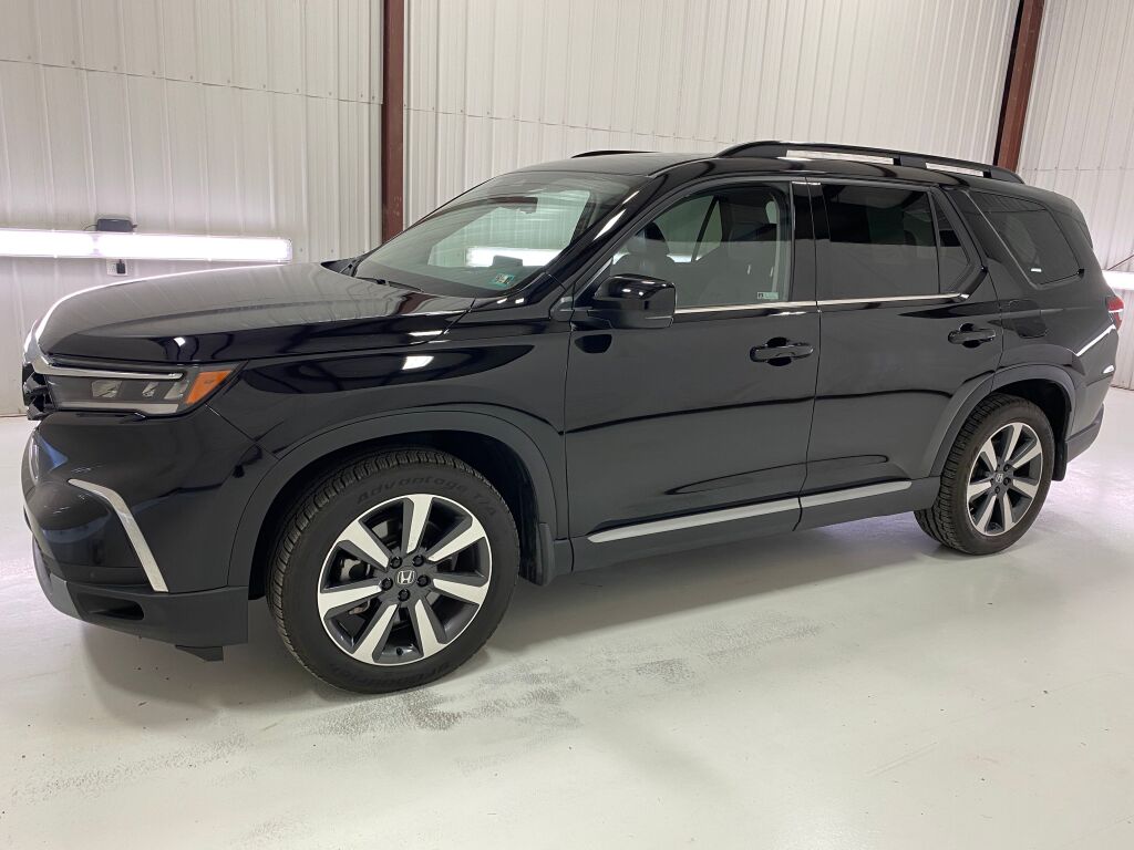 2024 Honda Pilot Touring Crystal Black Pearl at Spitzer Acura