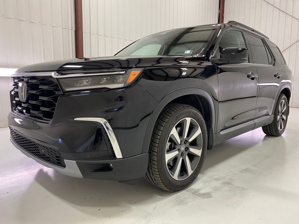2024 Honda Pilot Touring Crystal Black Pearl at Spitzer Acura