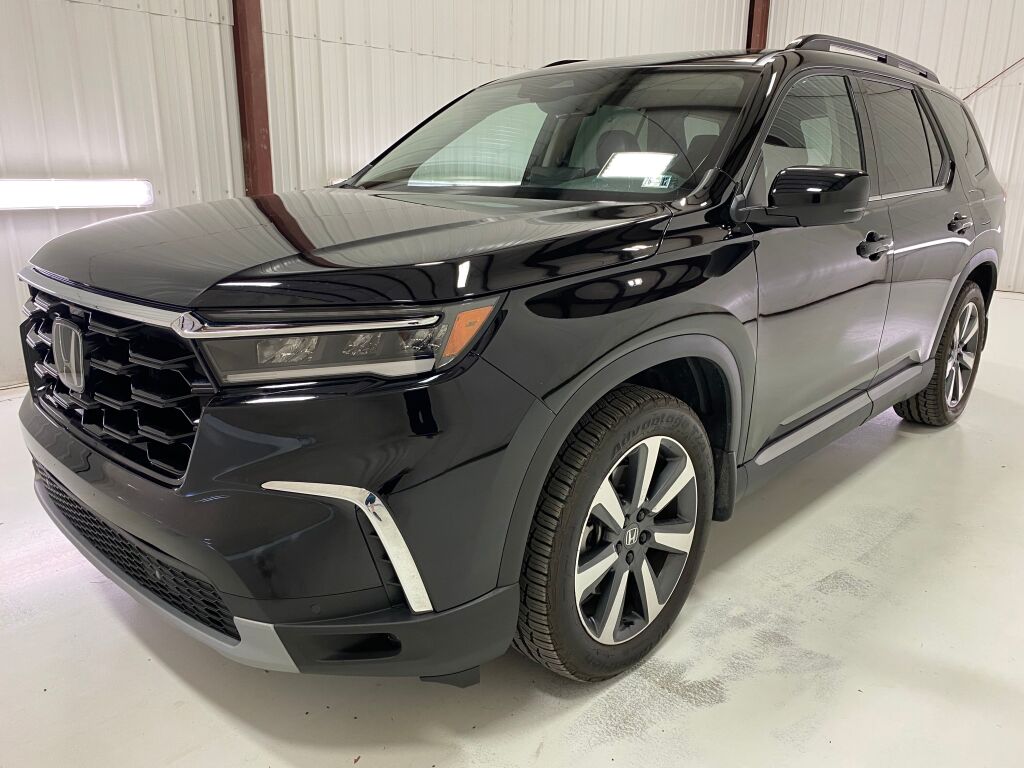 2024 Honda Pilot Touring Crystal Black Pearl at Spitzer Acura