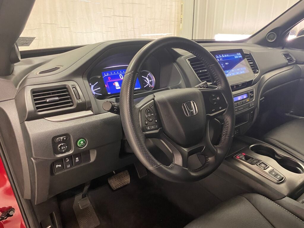 2023 Honda Passport EX-L Radiant Red Metallic II at Honda North