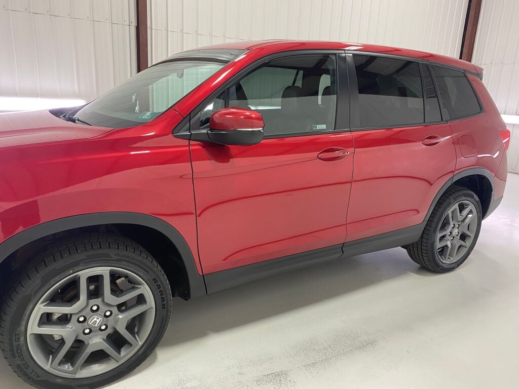 2023 Honda Passport EX-L Radiant Red Metallic II at Honda North