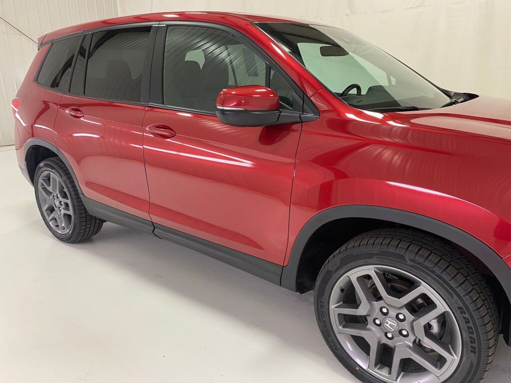 2023 Honda Passport EX-L Radiant Red Metallic II at Honda North