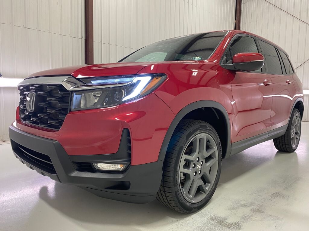 2023 Honda Passport EX-L Radiant Red Metallic II at Honda North
