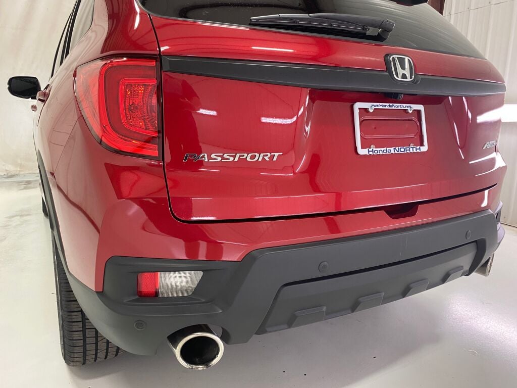 2023 Honda Passport EX-L Radiant Red Metallic II at Honda North