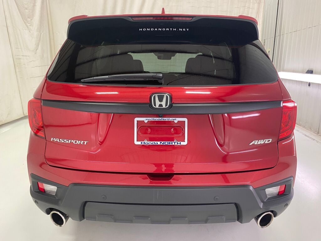 2023 Honda Passport EX-L Radiant Red Metallic II at Honda North