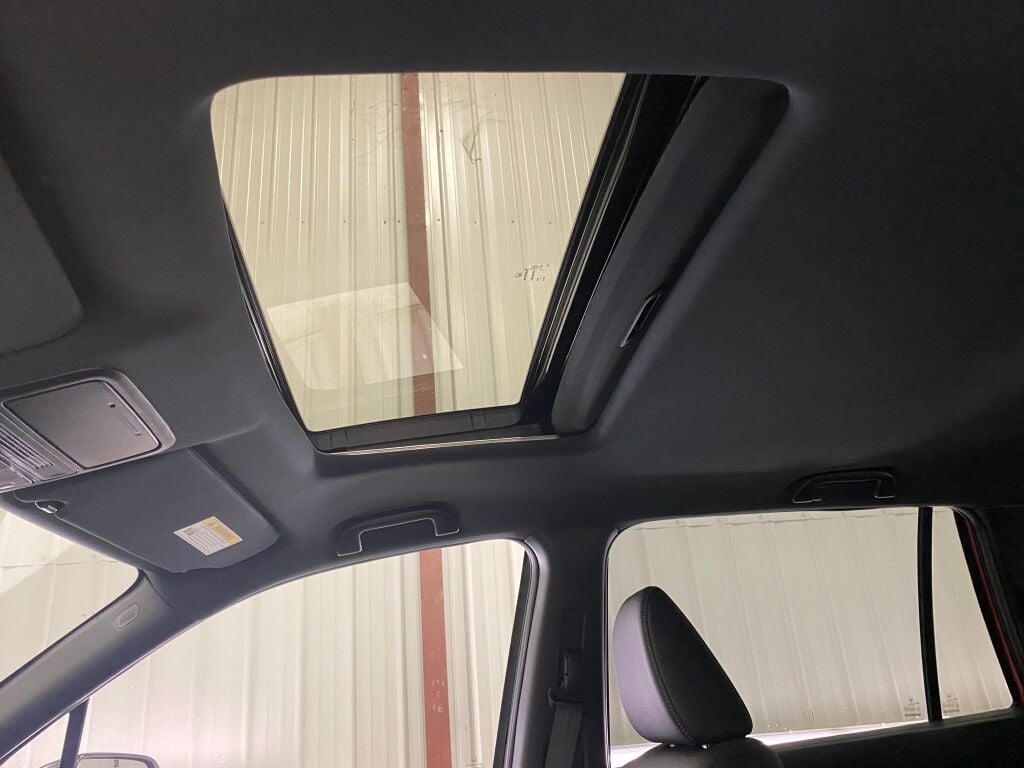 2023 Honda Passport EX-L Radiant Red Metallic II at Honda North