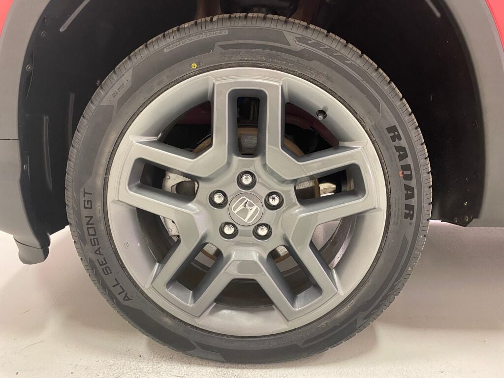 2023 Honda Passport EX-L Radiant Red Metallic II at Honda North
