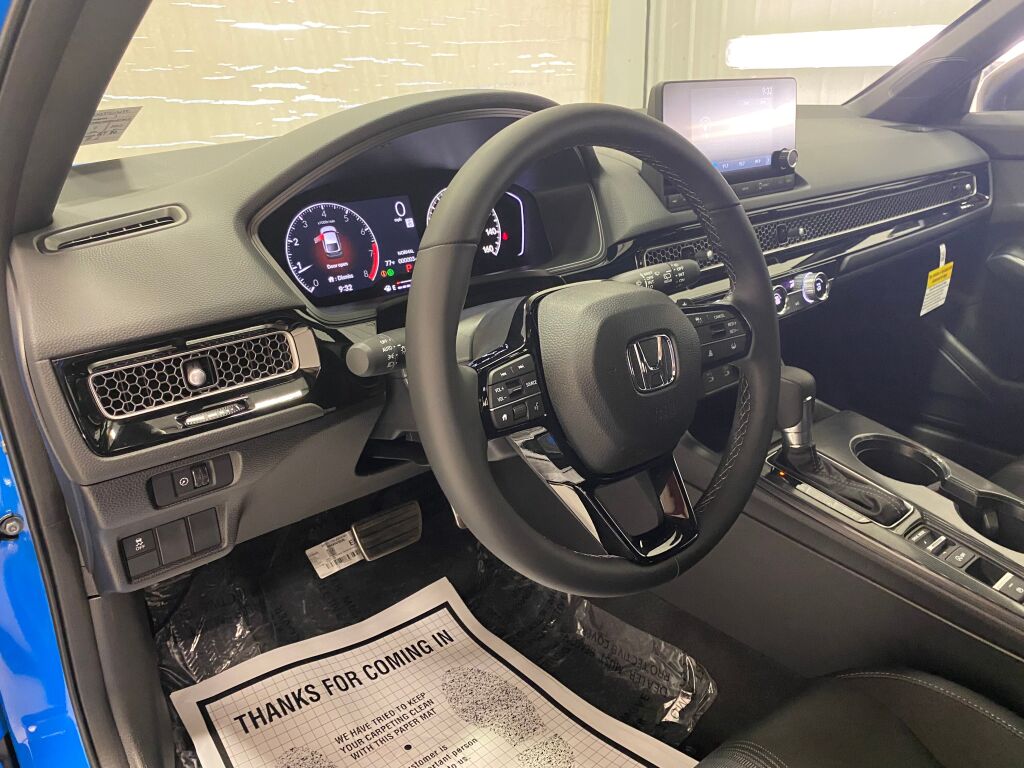 2026 Honda Civic Hatchback Sport BOOST BLUE PEARL at Honda North