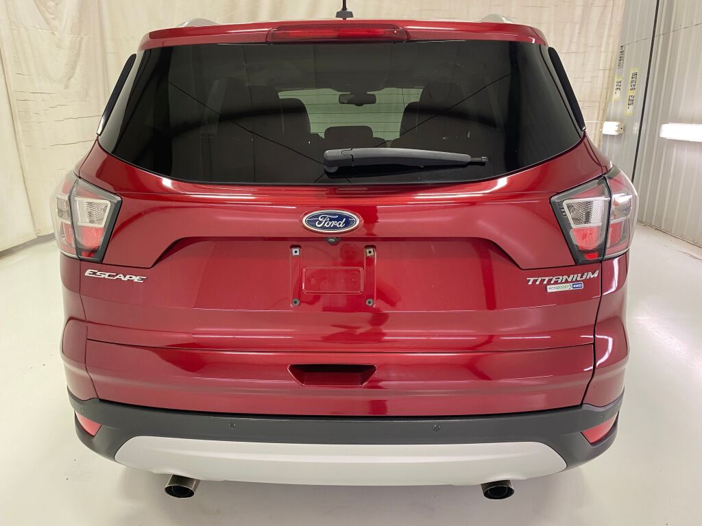 2017 Ford Escape Titanium Ruby Red Metallic Tinted Clearcoat at Honda North