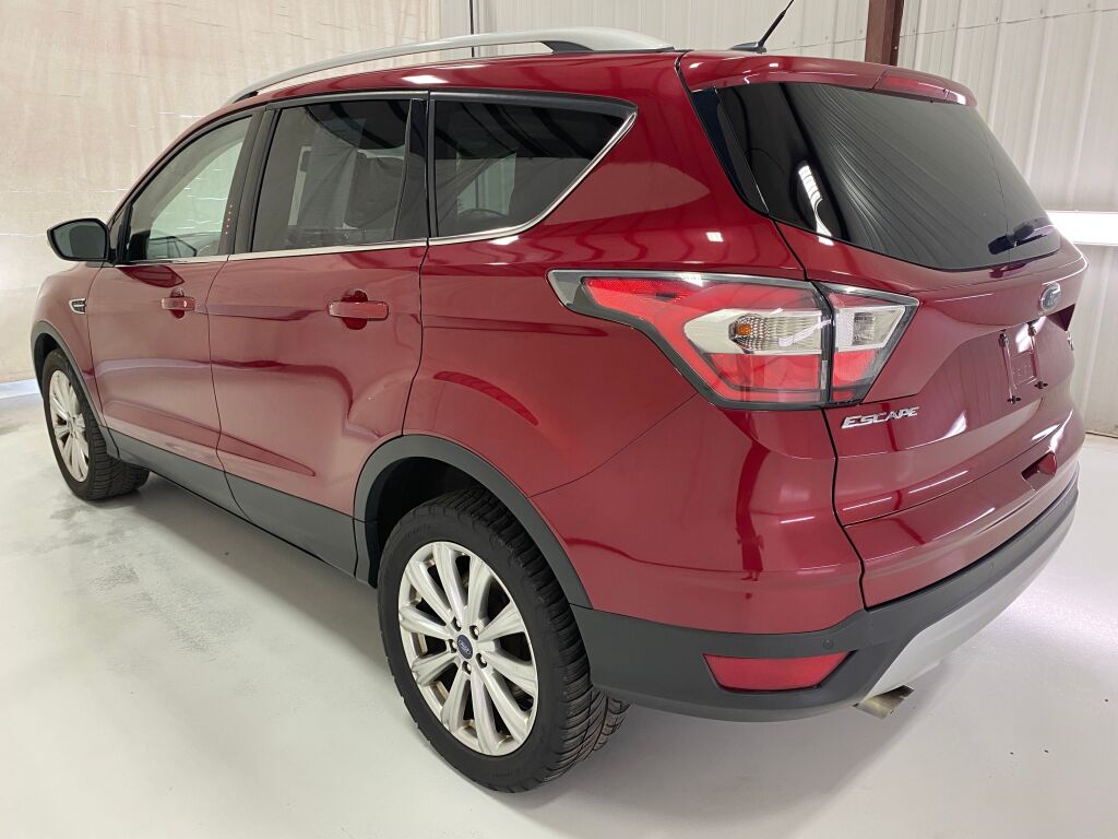 2017 Ford Escape Titanium Ruby Red Metallic Tinted Clearcoat at Honda North