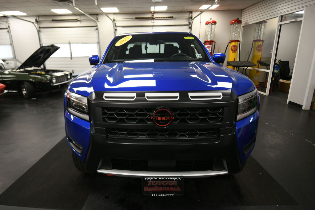 View vehicle photo 3